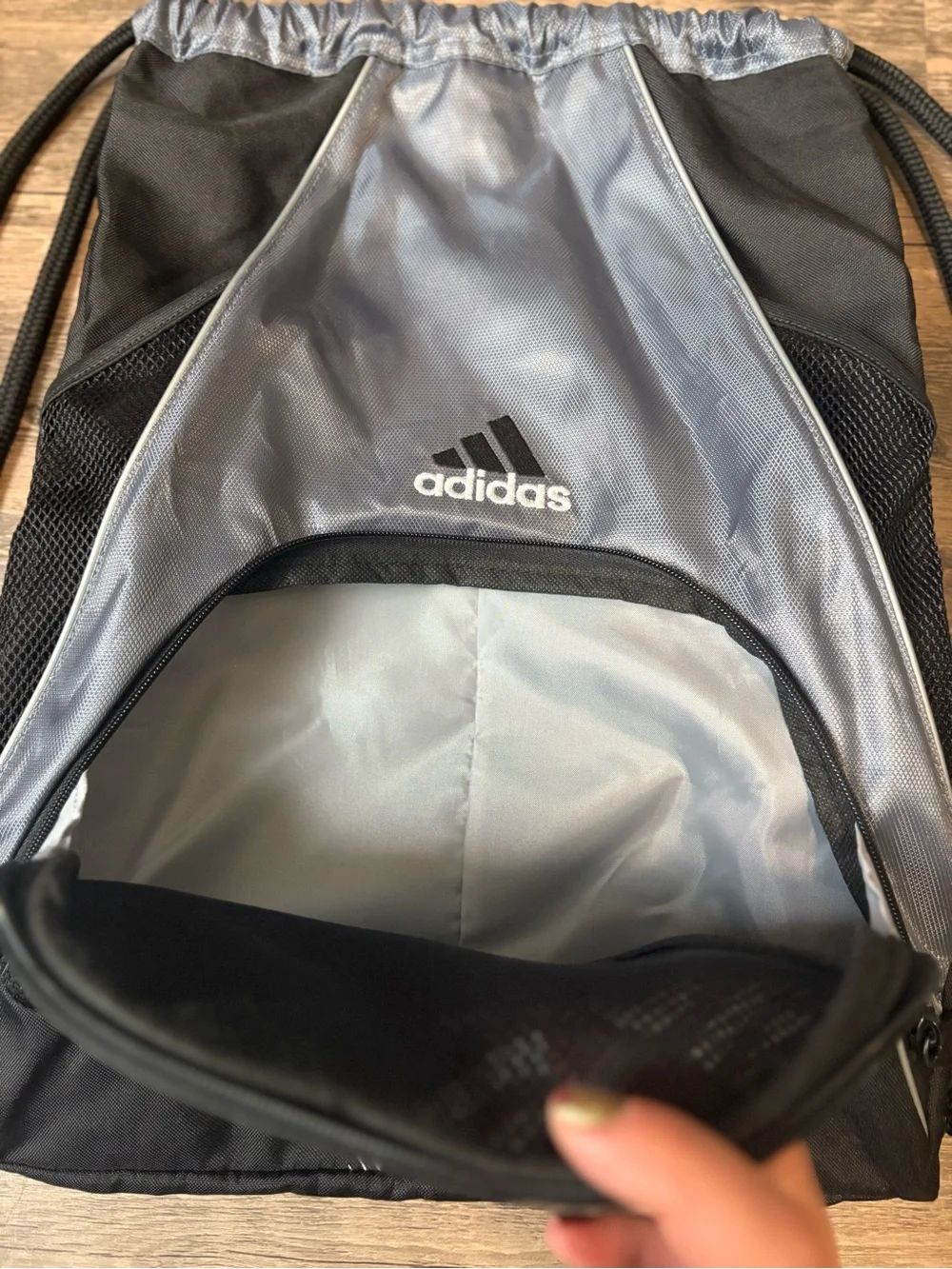 adidas Black and Silver Drawstring Backpack with Front Zip Pocket